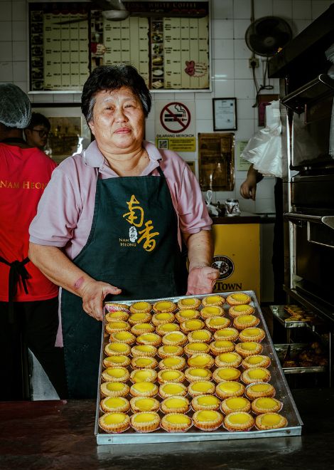 Wobbly Malaysian egg tarts with silky custard centres.