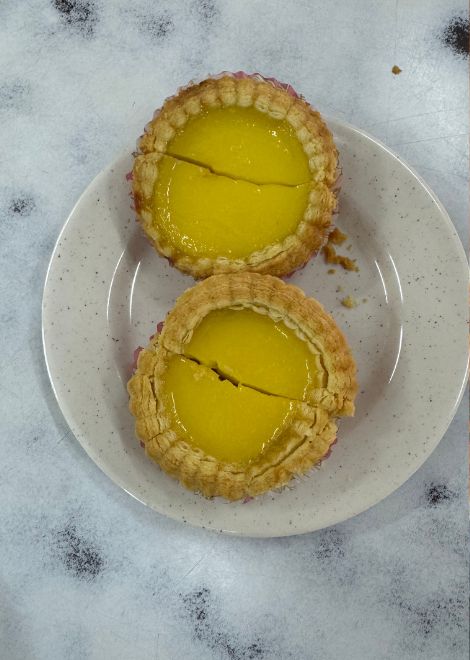 Wobbly Malaysian egg tarts with silky custard centres.