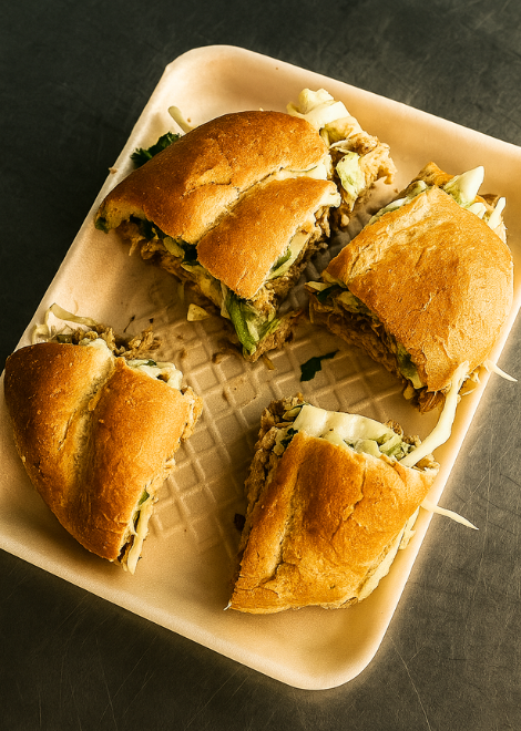 Tortas stuffed with tender, juice lechón cooked low and slow