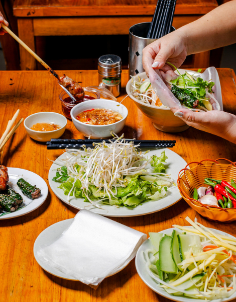 Smoky nem nướng meat skewers with fresh dipping sauce