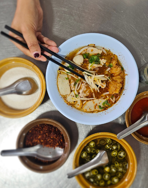 Tom yum pork noodle soup
