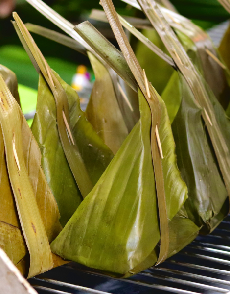 Banana leaf wrapped delicacies at the market 