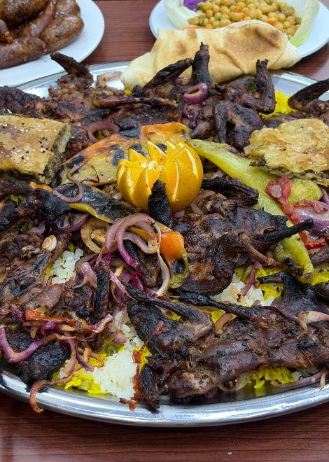 Chargrilled pigeon, served straight from the grill.