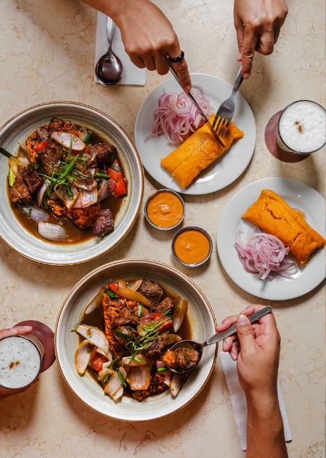 Finish with three Peruvian classics: tacu tacu, lomo saltado and tamal criollo.