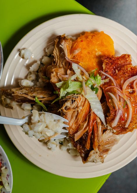 A plate of golden hornado with shatteringly crisp crackling.