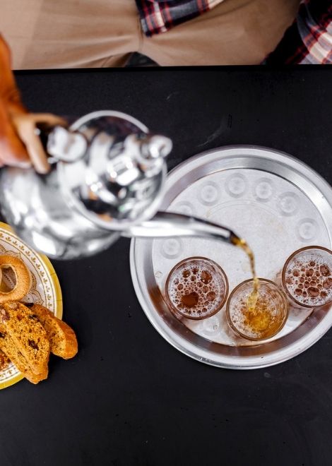 Sign off with high poured Moroccan mint tea