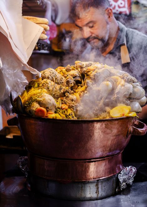 Steamed mfouar meat with spiced seffa rice noodles
