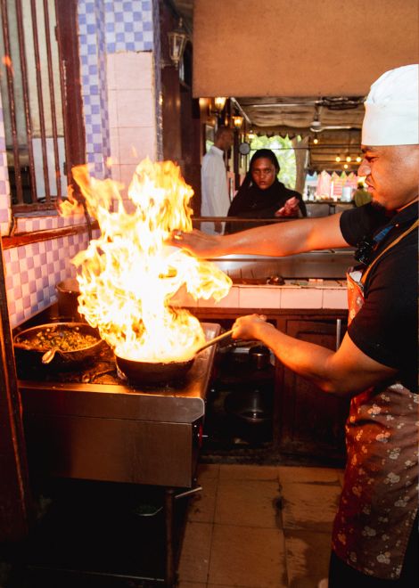 Eat at hidden spots beloved by Stone Town locals.