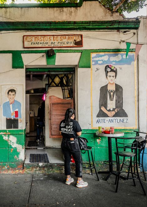 Visit local spots like this pulqueria 