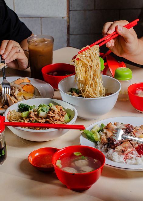 Silky bakmie ayam noodles and hearty nasi campur with pork and chicken.