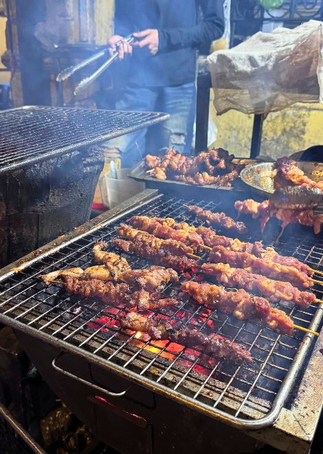 Juicy marinated chicken grilled over red-hot coals.