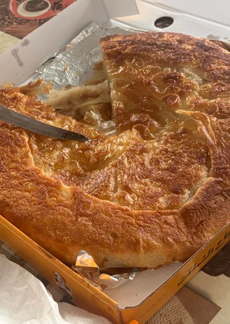 Flaky, buttery feteer served warm from the oven.