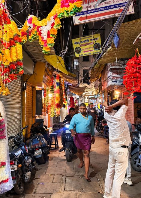 Wander through garland-strung lanes as evening settles over the old city.