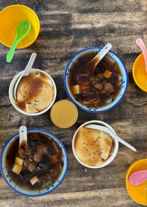 A bowl of silky tau fu fa with fragrant syrup.