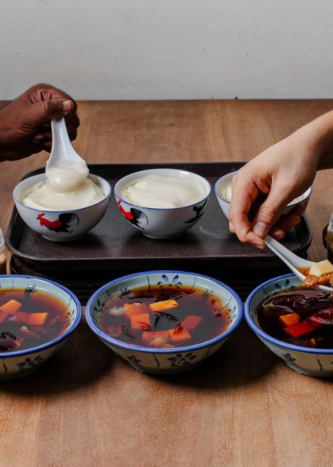 A bowl of silky tau fu fa with fragrant syrup.