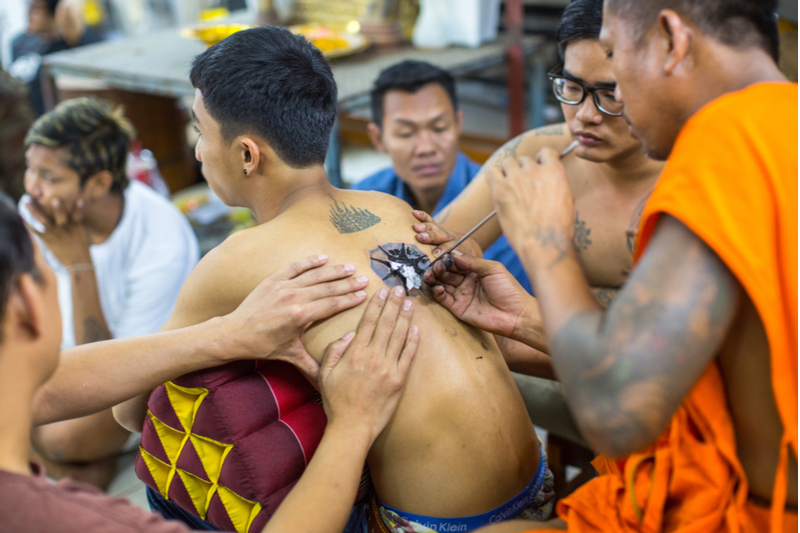 sak yant tattoo in Bangkok - monk