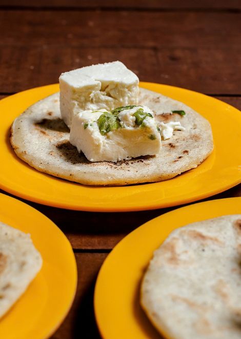 Queso de capita con loroco on warm tortillas. 