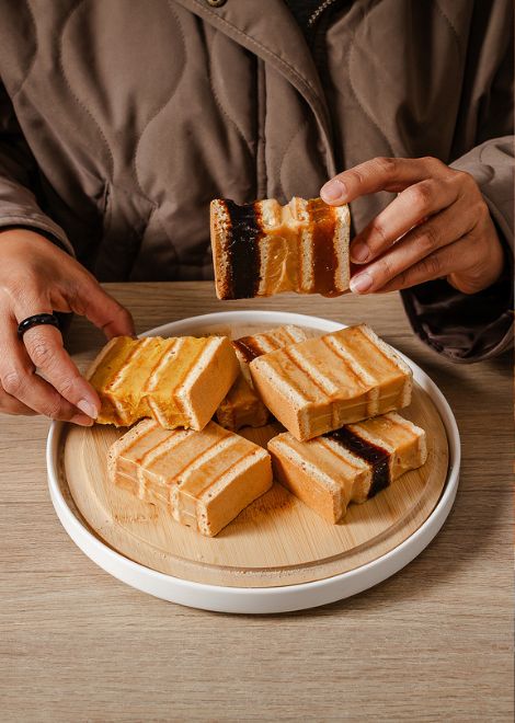 Layers of delicate biscuit, sweet fillings, and generations of tradition make King Kong one of Peru's most beloved treats