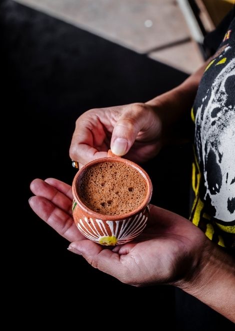 Frothy chocolate de agua in one of Oaxaca's best food markets