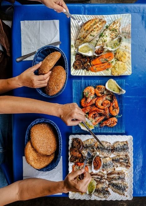 Grilled fish and prawns and chemoula sardines
