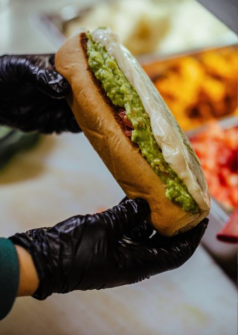 Loaded with avocado, tomato, and mayonnaise, the completo is Chile's famously over-the-top take on the hot dog