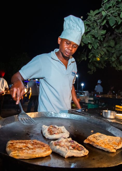 End the evening with tastings at Zanzibar's iconic Forodhani Night Market.