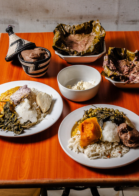 Smoked luwombo fish stew in peanut sauce with mixed sides