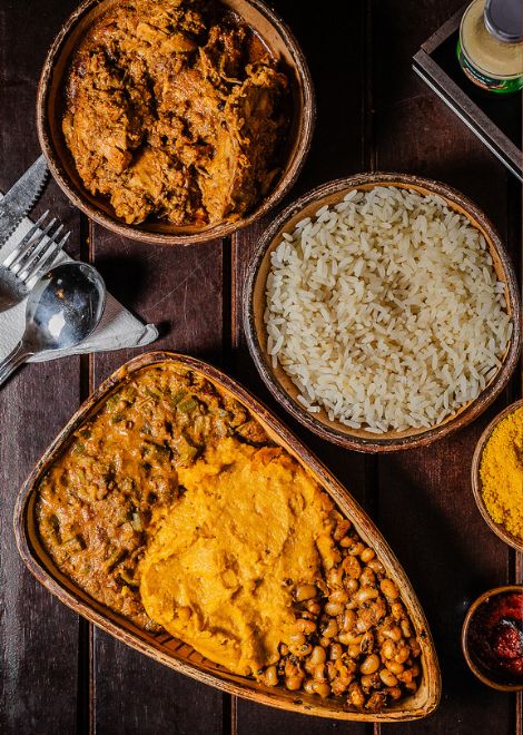 Bahian stewed chicken with farofa, okra, vatapa and fluffy rice