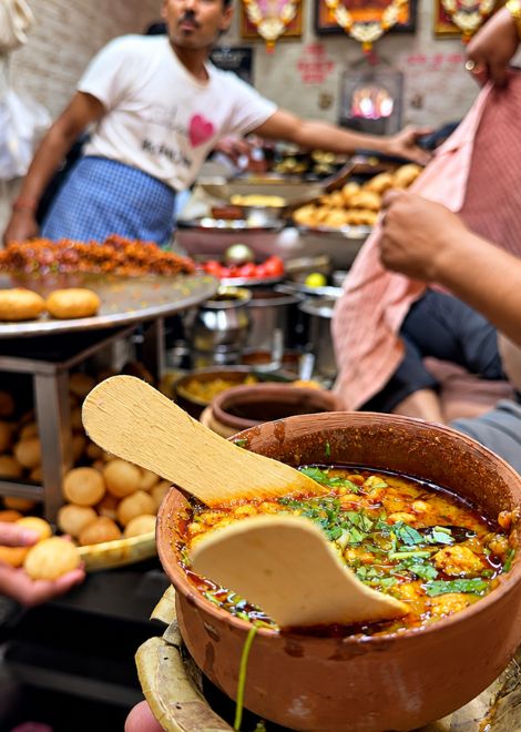 Tamatar chaat served steaming in a clay kulhad.