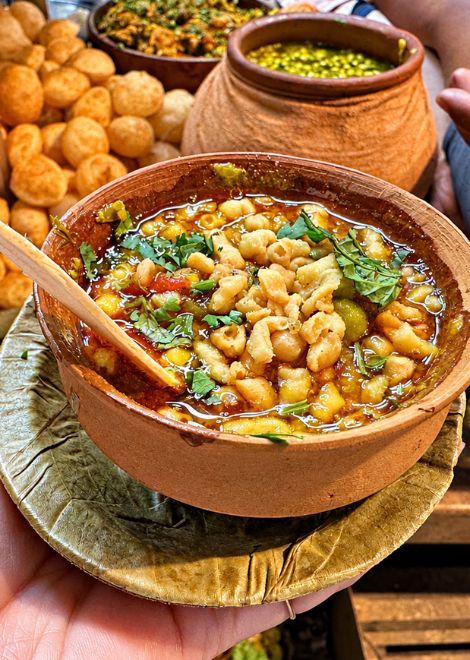 Taste your way through Varanasi with 15+ tastings, from bubbling chaat to creamy rabdi and a sunset boat ride.