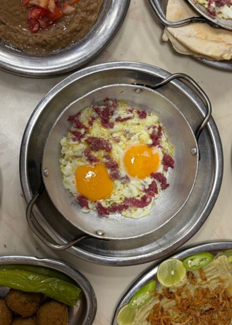 Alexandrian eggs with rich, smoky pastrami.