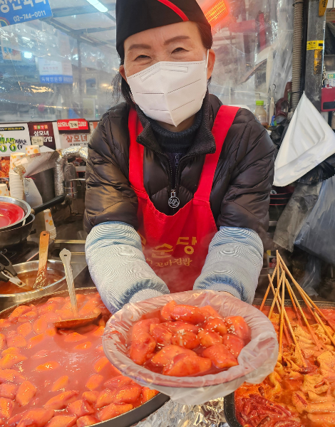 Iconic tteokbokki in a velvet-red glaze