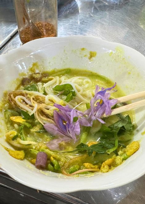 Fragrant num banh chok, Cambodia's beloved Khmer noodles.