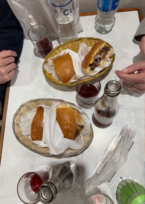 Juicey pork lechon sandwiches with kola escocesa