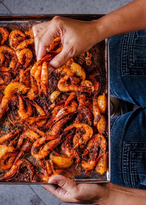 Harissa marinated prawns cooked in a communal oven
