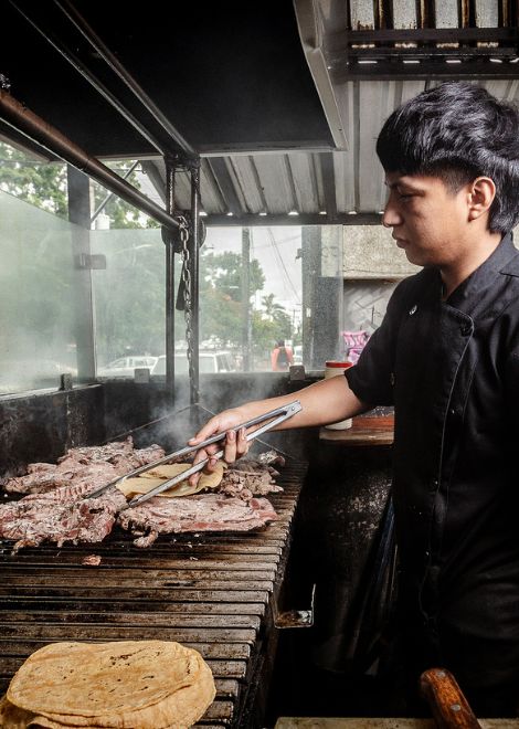 Smoky steak cooked over hot charcoal