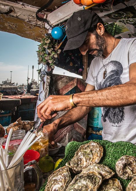 Wooden shack next to the port with fresh seafood