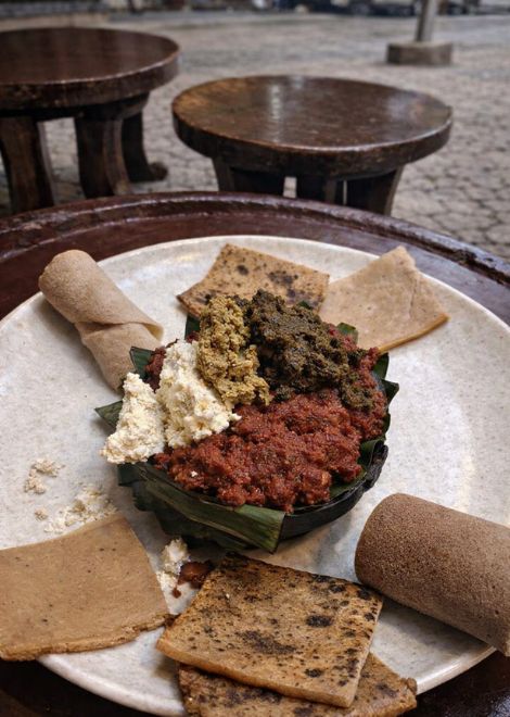 Kifto,  minced beef with warming mitmita, cottage cheese and kale
