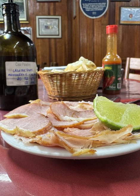 Sliced picanha suina pork at a local eatery