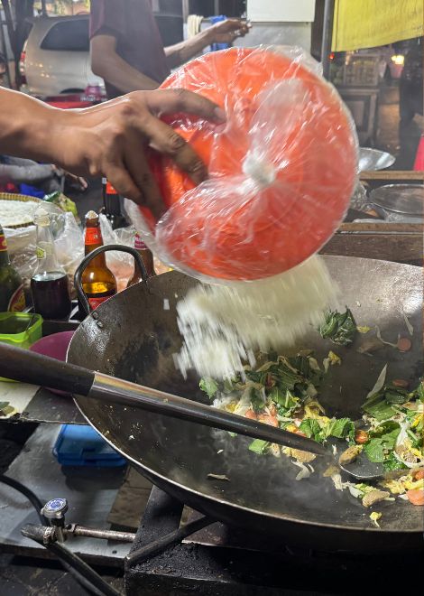 The unmistakable wok hei in Jakarta's nasi goreng. 