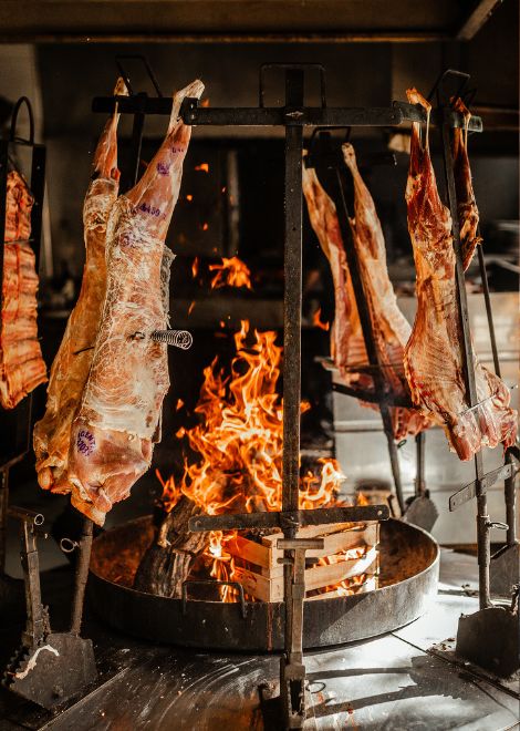 Step into a parrilla and savour the smoky flavours of an authentic Argentine asado