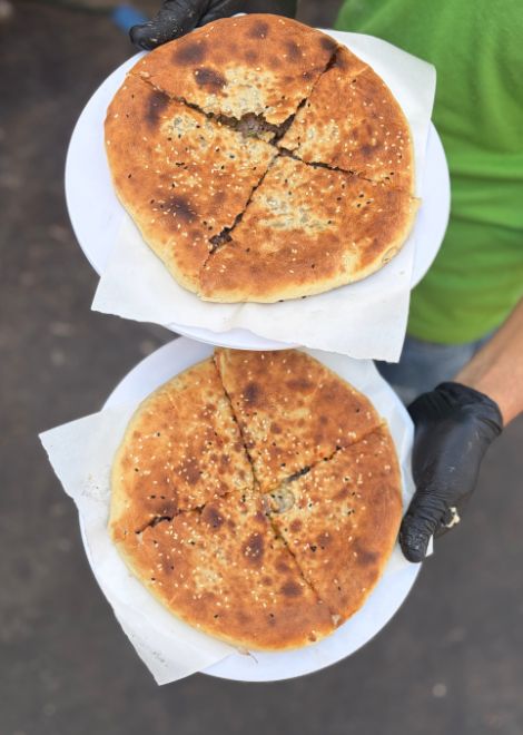 Freshly baked hawawshi, filled with perfectly seasoned beef.