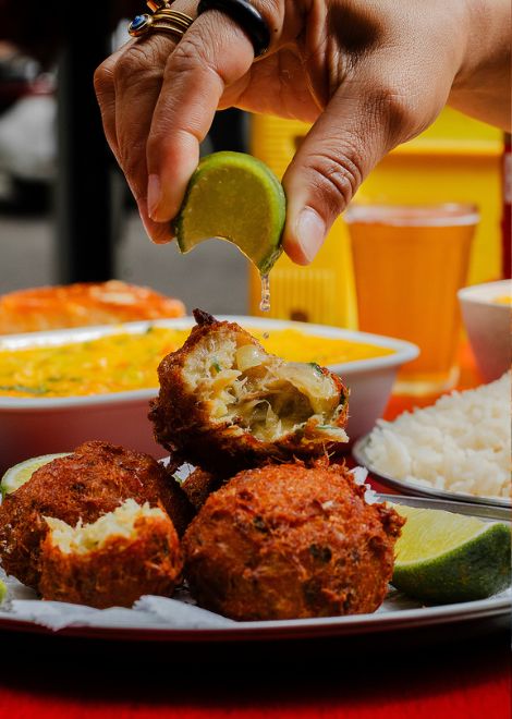 Crisp golden cod fritters finished with a squeeze of fresh lime