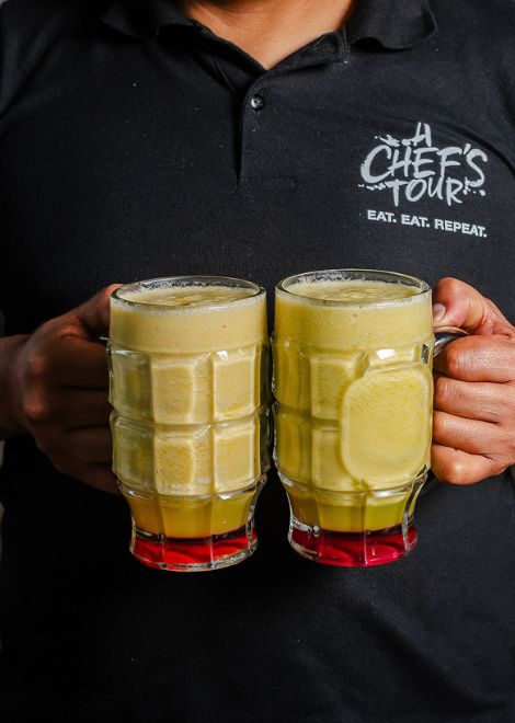 Glasses of freshly squeezed jugo de naranjilla.