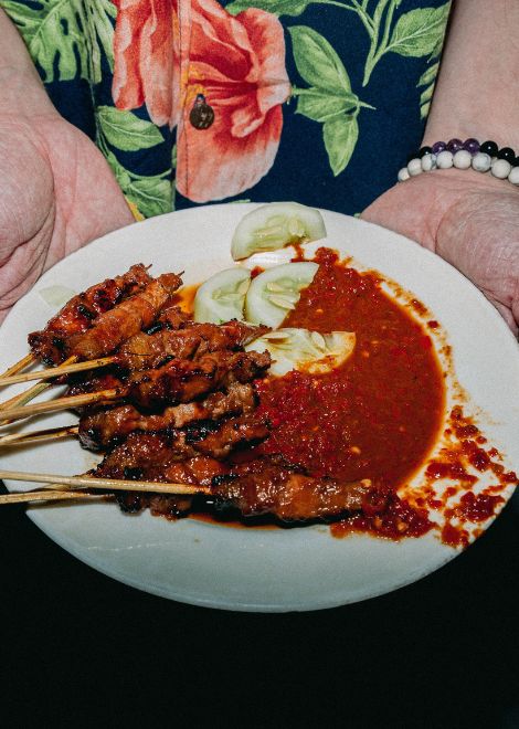 Grilled sate babi with Indonesian spiced sambal