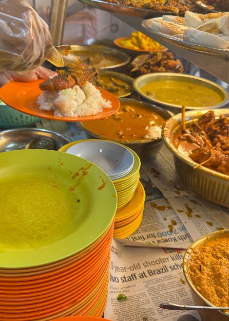 Bold, spice-laden nasi kandar at a local institution.