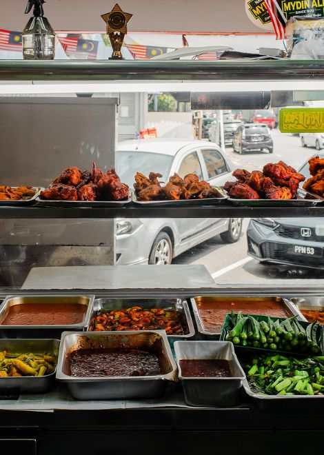 Bold, spice-laden nasi kandar at a local institution.