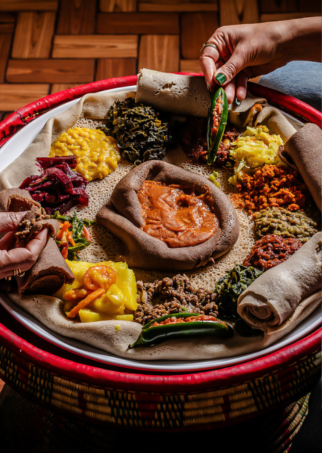 Understand why tangy injera pairs well with classic Ethiopian beyaynetu