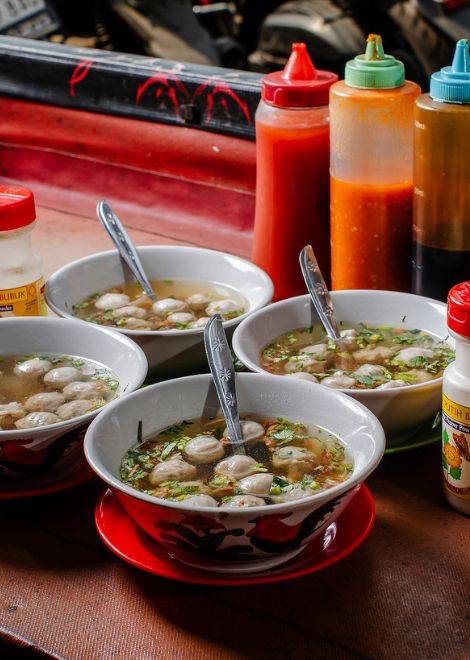 Tender beef meatballs swimming in a steaming, savoury broth.