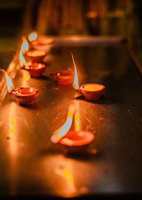 Lit candles at the Sri Mahamariamman Temple